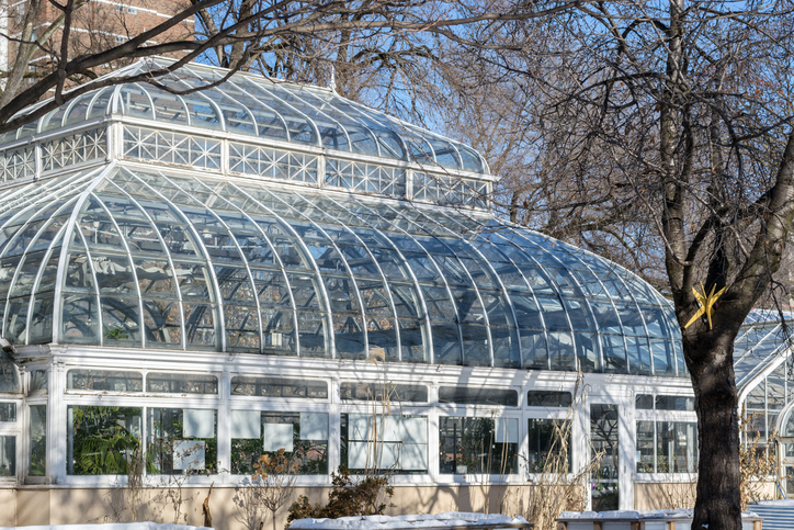 Allan Gardens greenhouse and horticulture building on a cool clear blue sky winter day